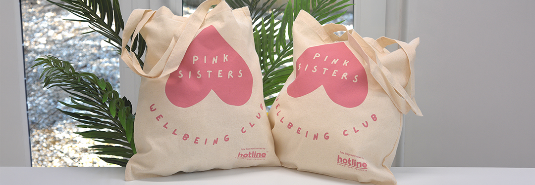 Pink Sisters Wellbeing Club: A Roller Banner, Tote Bags and Pens for a Community Stand